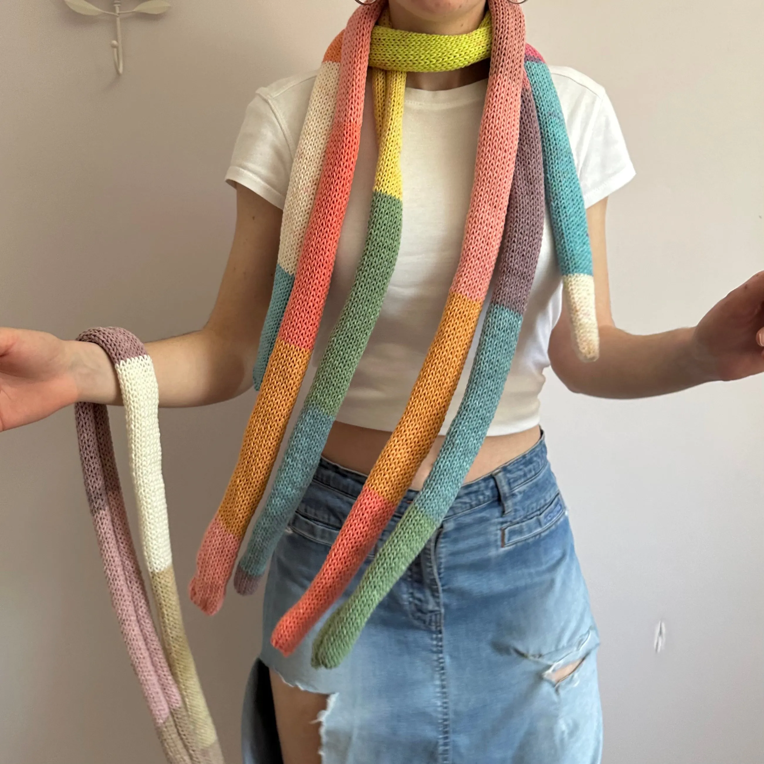 Handmade knitted colour block skinny scarf in beige and dusky pink
