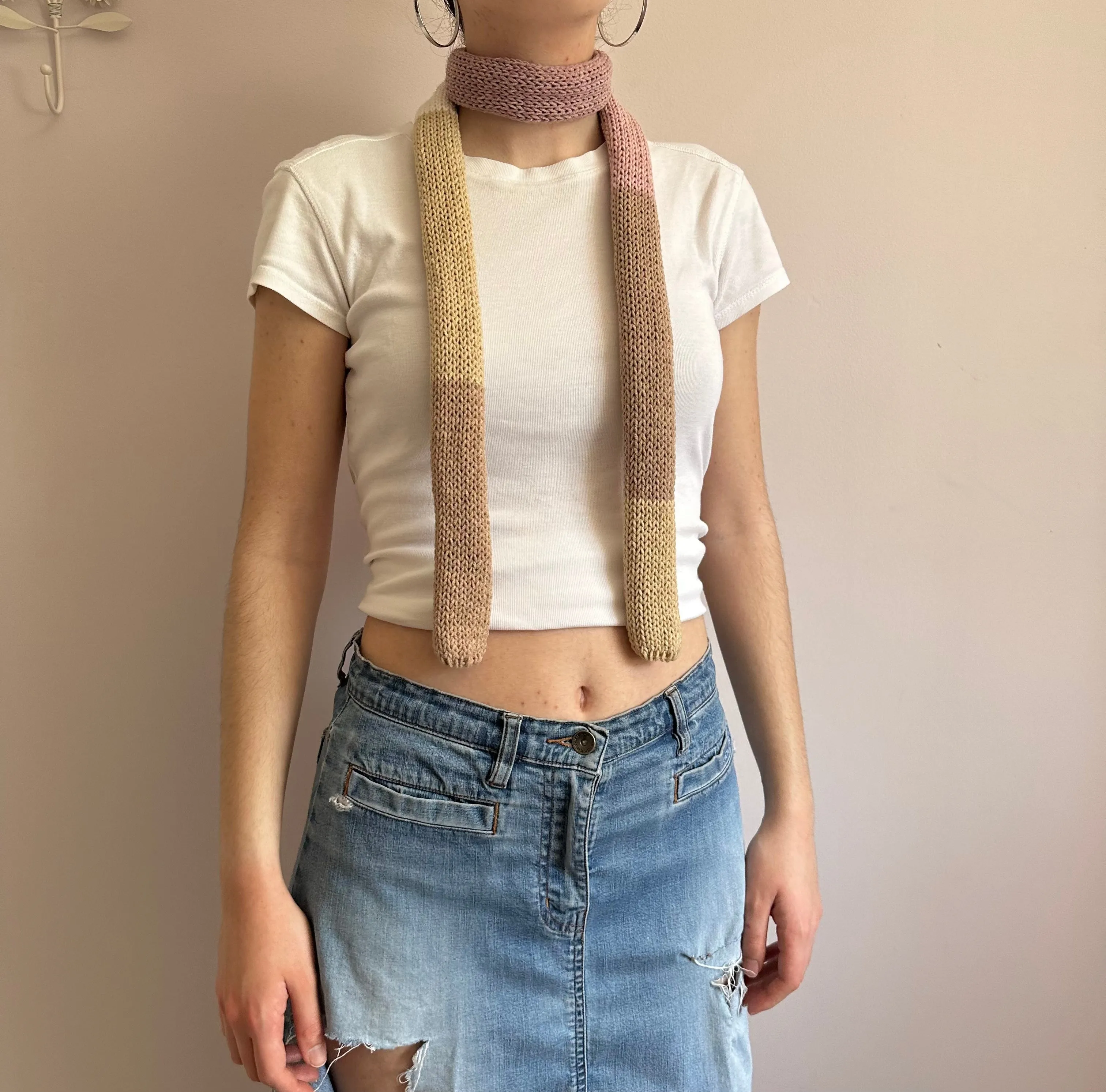 Handmade knitted colour block skinny scarf in beige and dusky pink